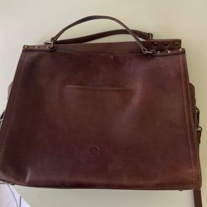 Pretty brown leather pocketbook with shoulder strap